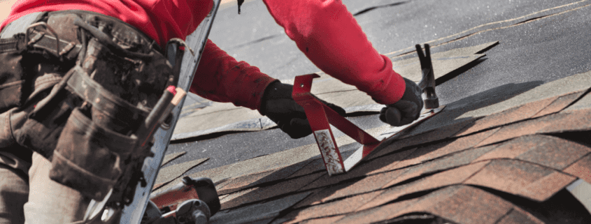 A variety of roofing materials including asphalt shingles and roofing tools