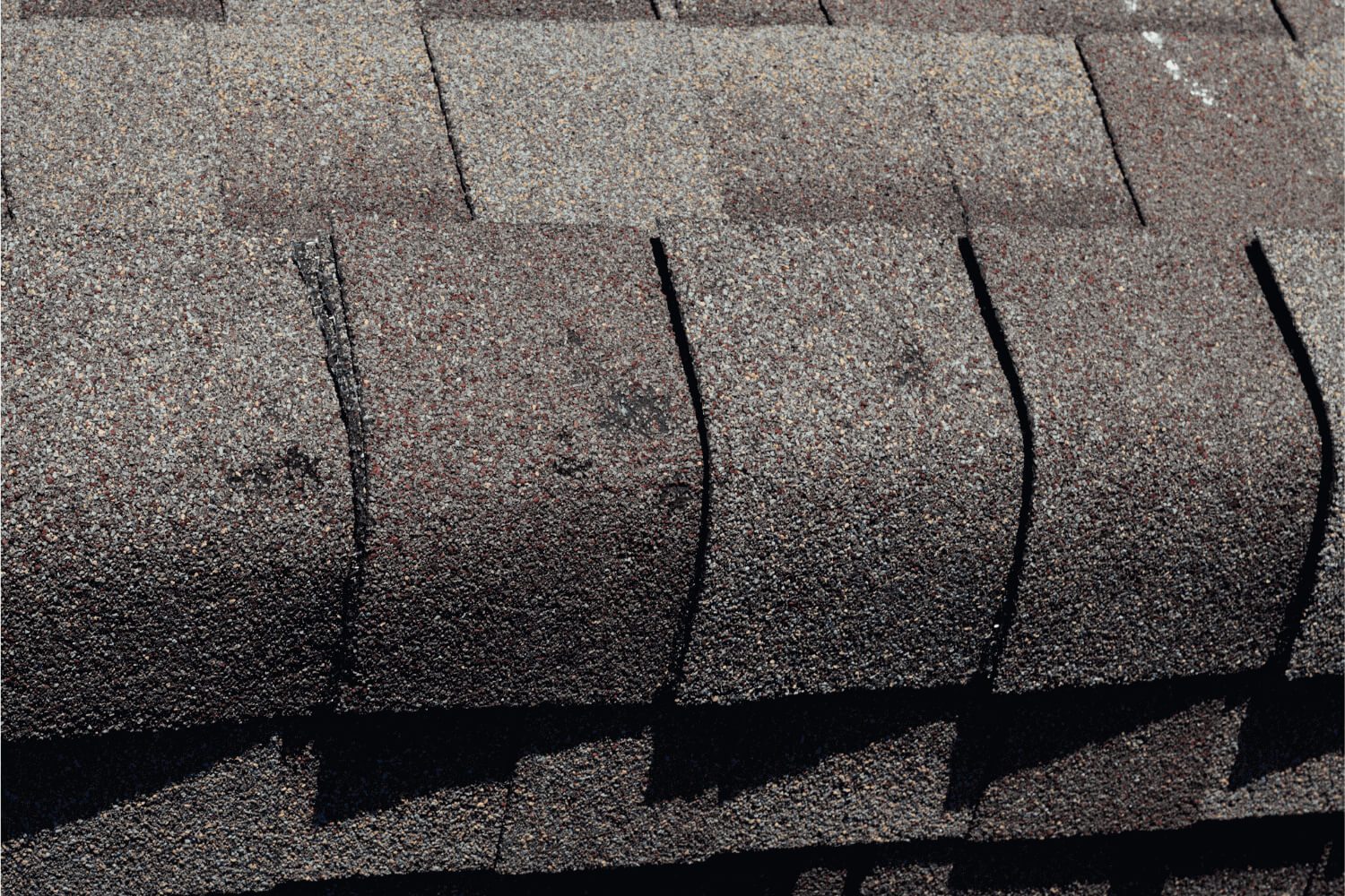 An example of hail damage on a roof, highlighting dents and impact marks
