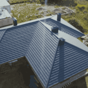 An image of the preparation process for roof panels before ridge cap installation
