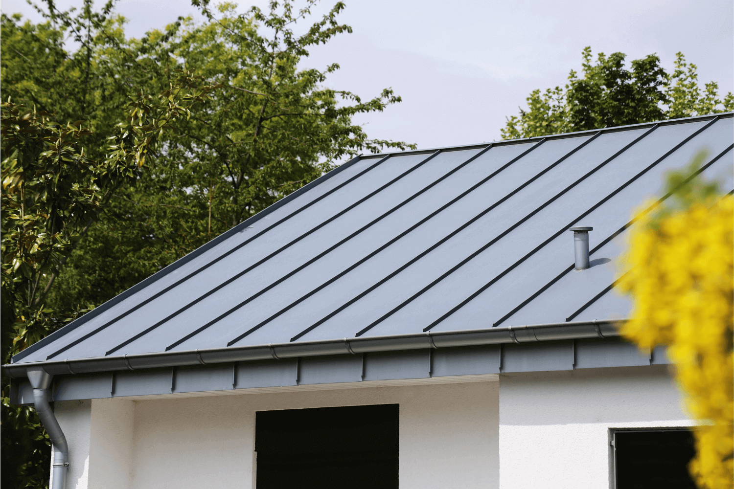 An image showing different types of ridge caps for corrugated metal roofs