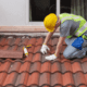 A roof with multiple layers of shingles showcasing the second layer of shingles on the roof.