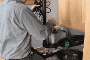 A step-by-step guide illustrating the replacement of a sump pump.
