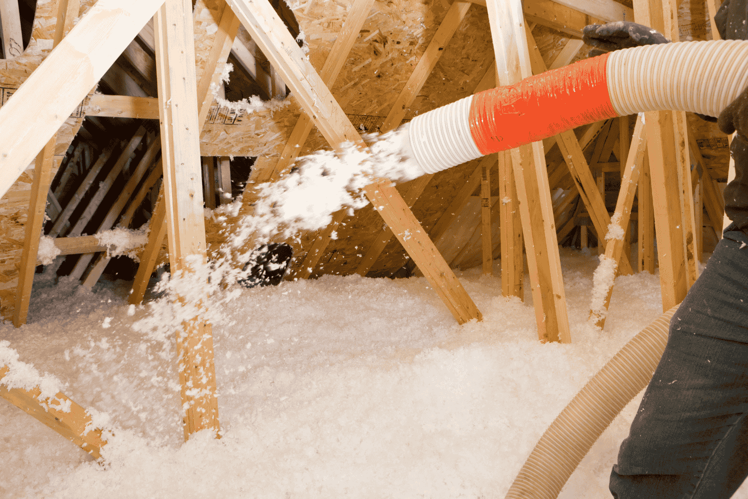 How to Efficiently Install Loose Fill Insulation by Hand 4 Filling floor joists with loose fill insulation..