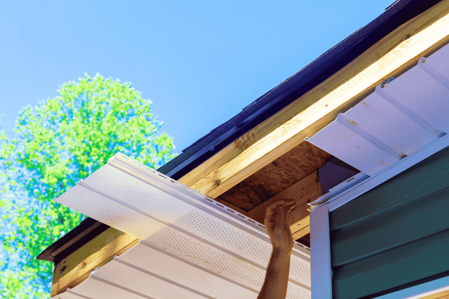 Best Practices for Installation of Soffit: A Step-by-Step Guide 2 Installing soffit over open eaves.