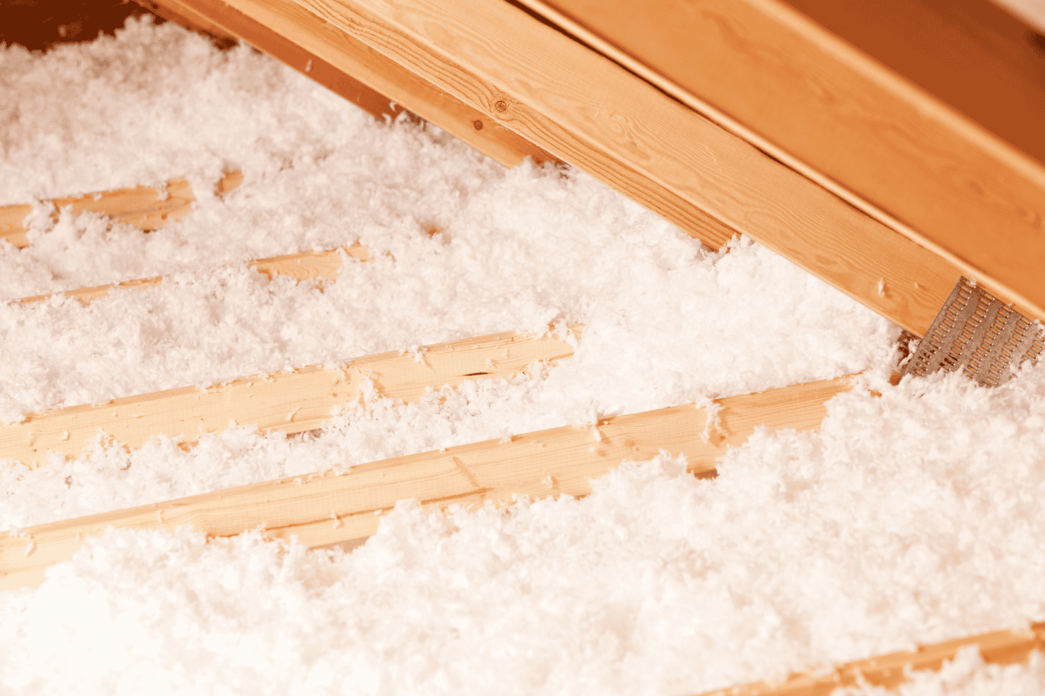 How to Efficiently Install Loose Fill Insulation by Hand 5 Sealing and final touches in the attic insulation process.