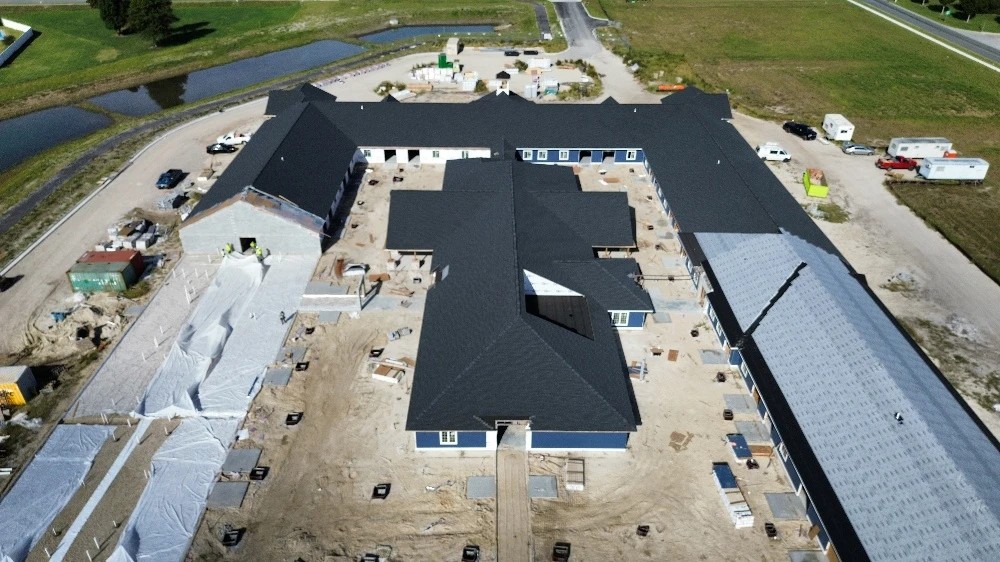 Nappanee, IN 2 An aerial perspective captures extensive roofing installation across a large facility, highlighting high-capacity commercial roofing services.