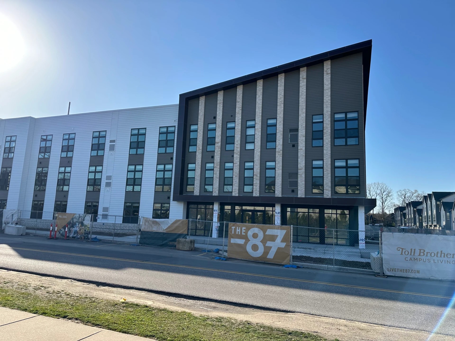 Saint Joseph, MI 2 A large, modern multi-family commercial building stands ready for residents, highlighting the scale of expert commercial roofing services.
